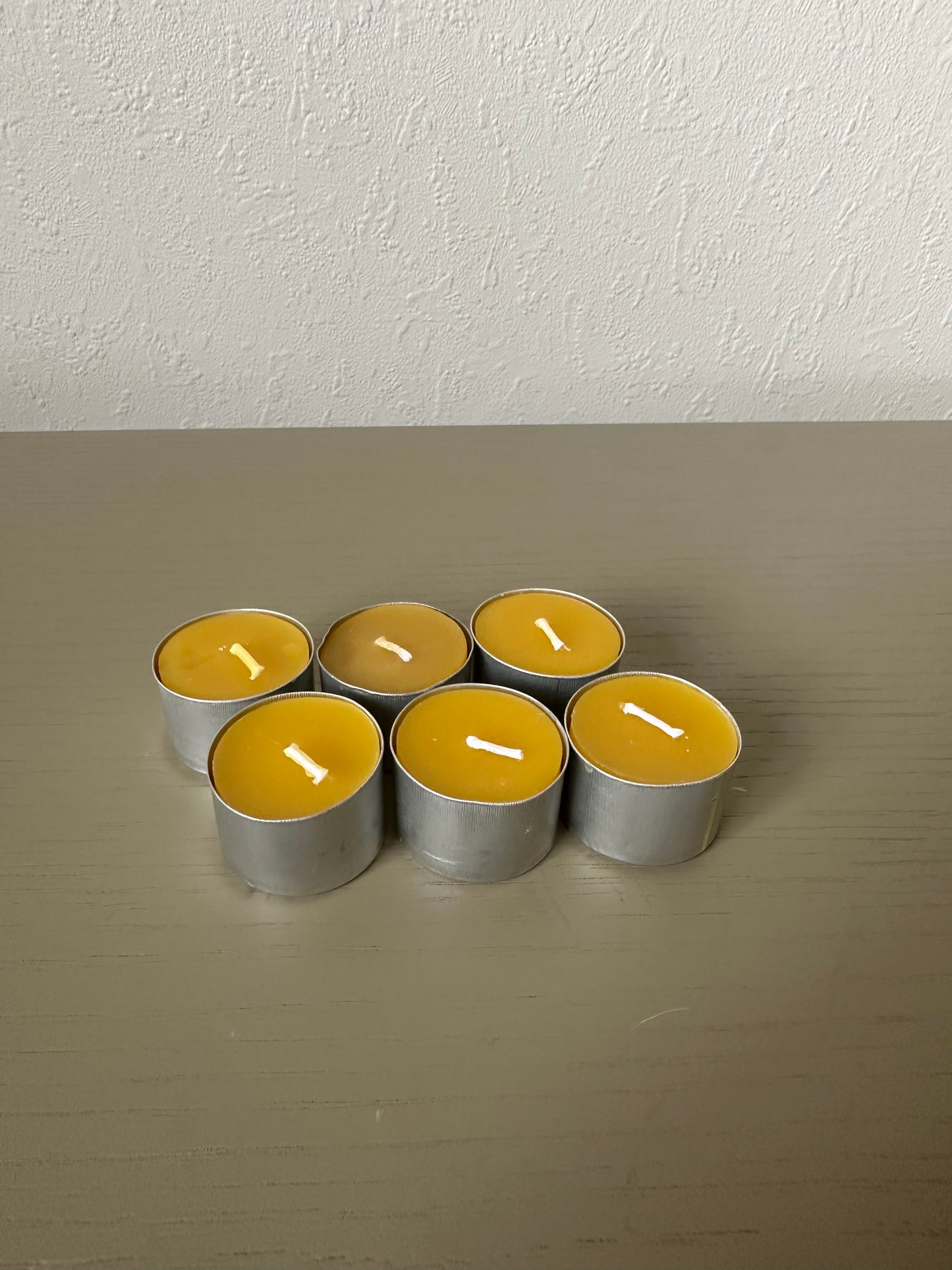 beeswax tea-light candle